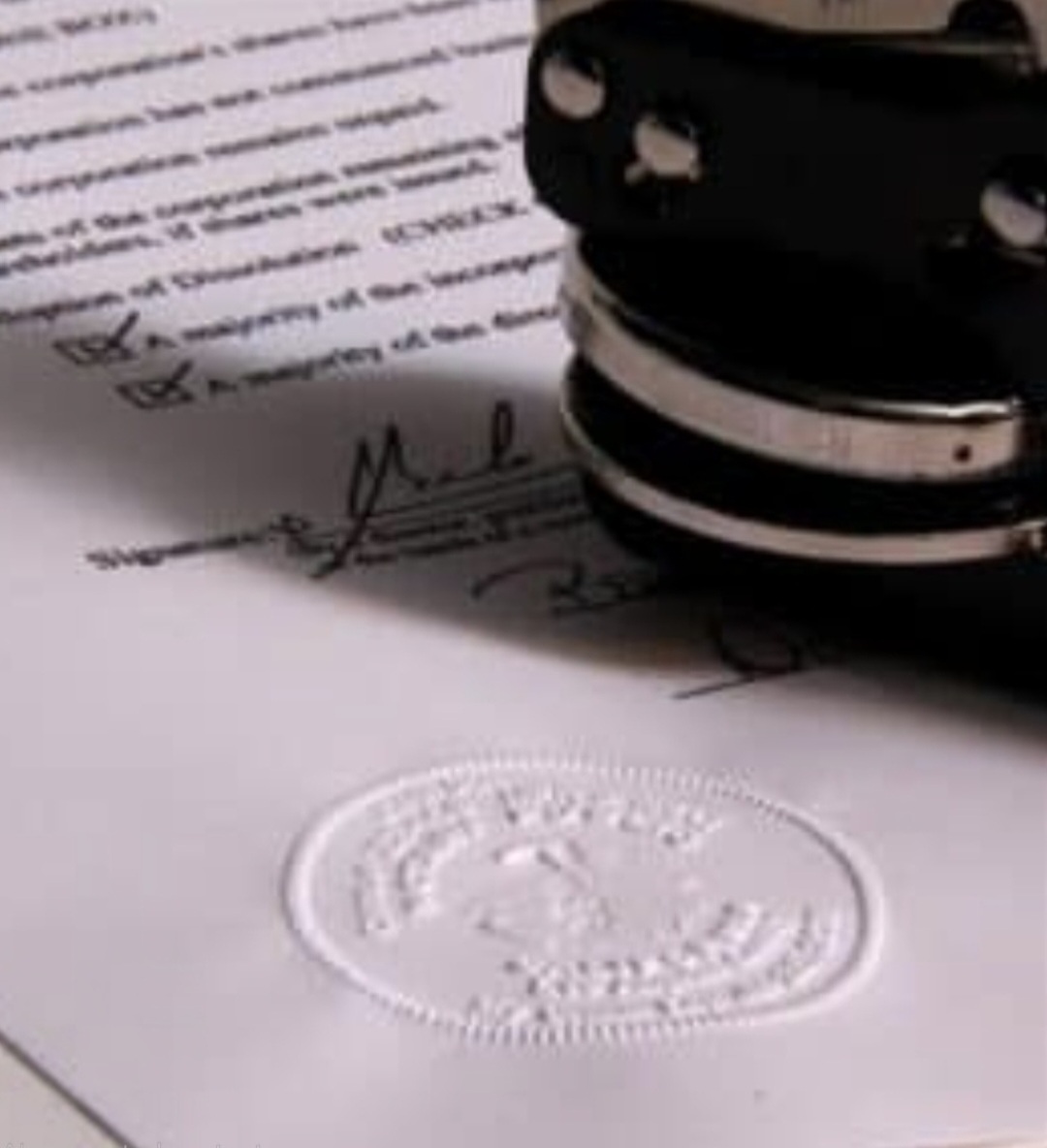Notary seal embossed on a notarized document by A2Z Notary Group in Belmont, MA